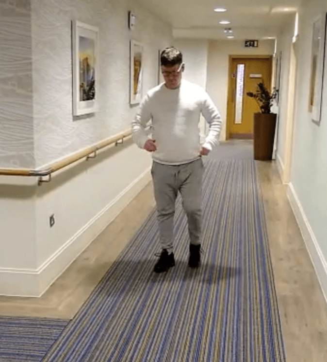 Chris and Running - Running in the gym corridor